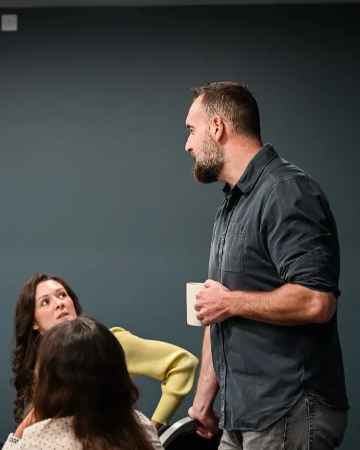 Chris Bedford talking with business owners during a workshop exercise